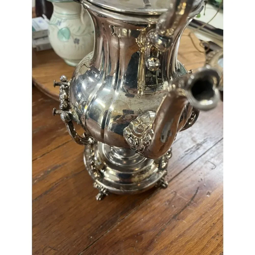 Towle tilting teapot